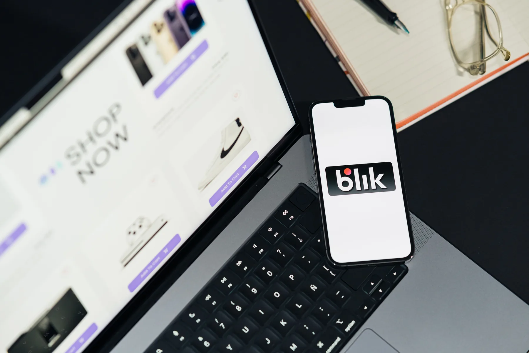 Commerce experience displayed across laptop and mobile screens