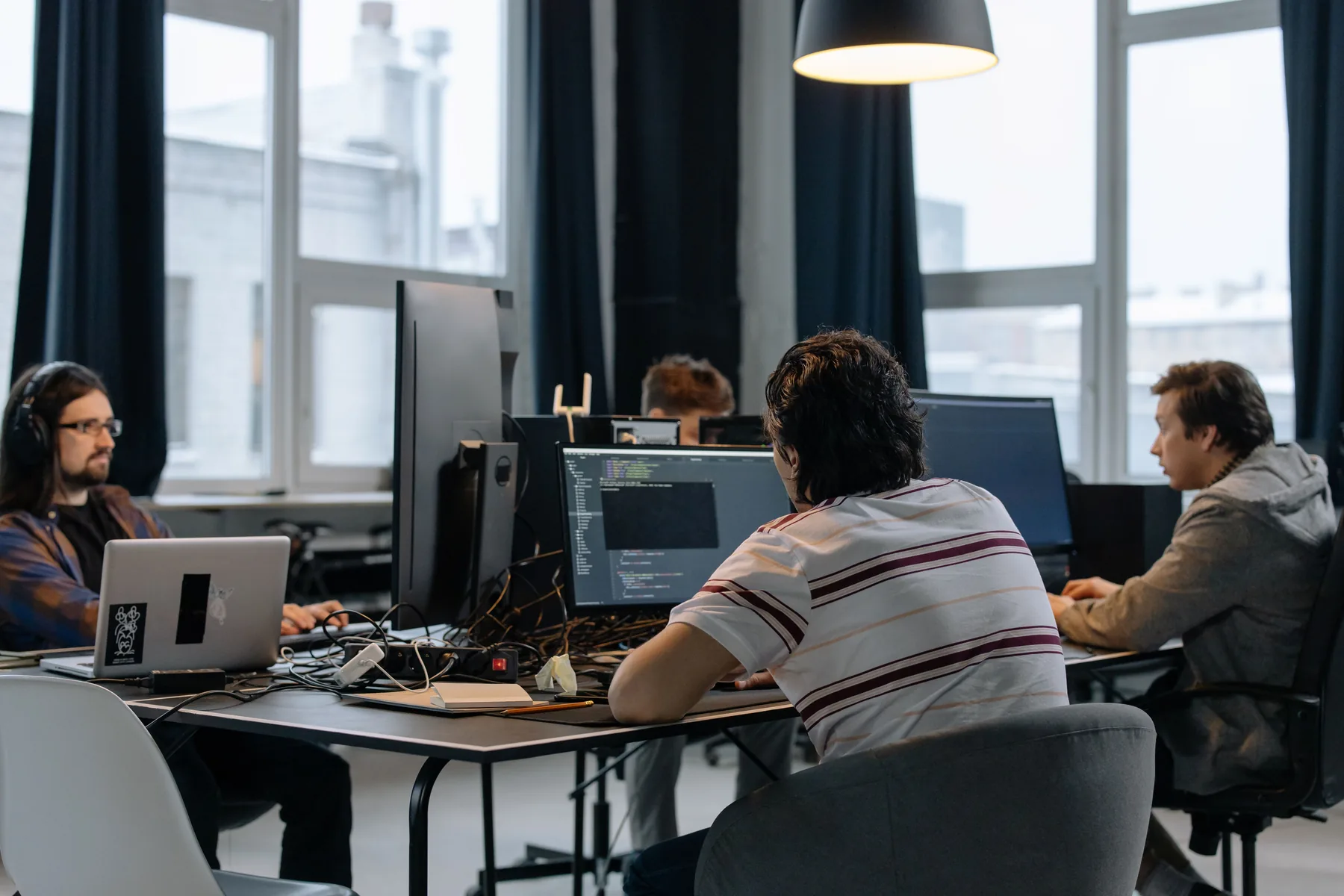 Technology team collaborating in a modern office